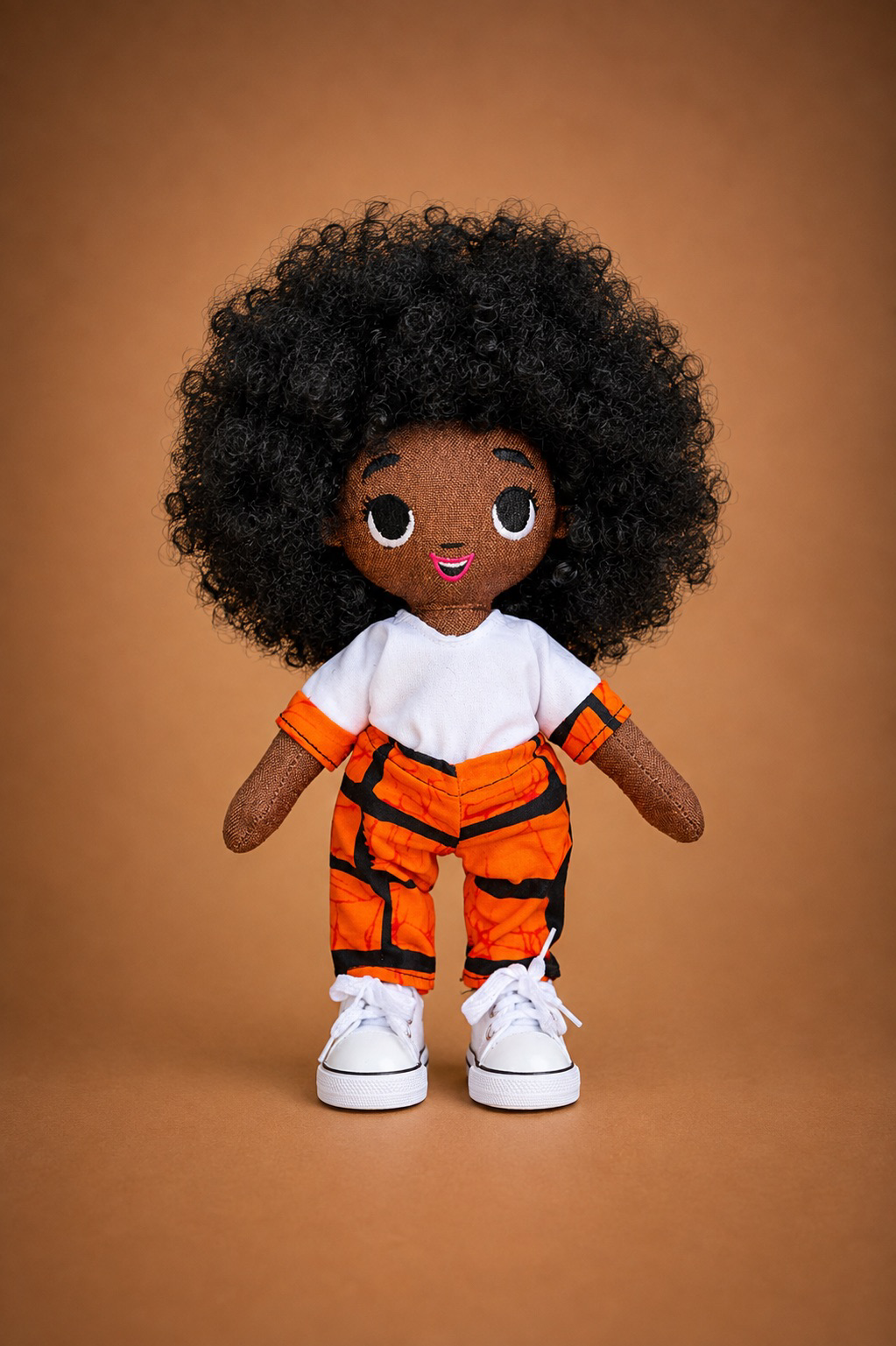 Tara doll in her orange outfit
